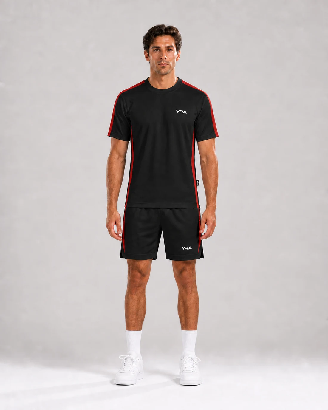 Conceito Performance masculina Rubi (preto): camiseta e shorts no modelo